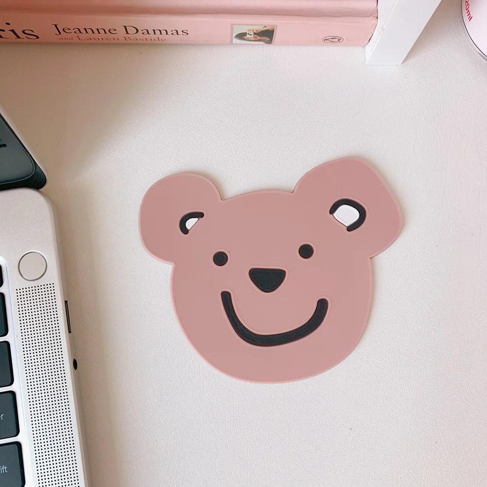 Adorable Drink Coaster - Brown bear-themed silicone coaster with a smiling face.