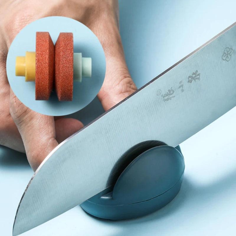 Blade Boost Mini Knife Sharpener - Close-up of the tool in use, sharpening a knife blade.