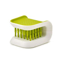 Sink Hero Utensil Scrubber - Compact green scrubber for easy kitchen cleaning.