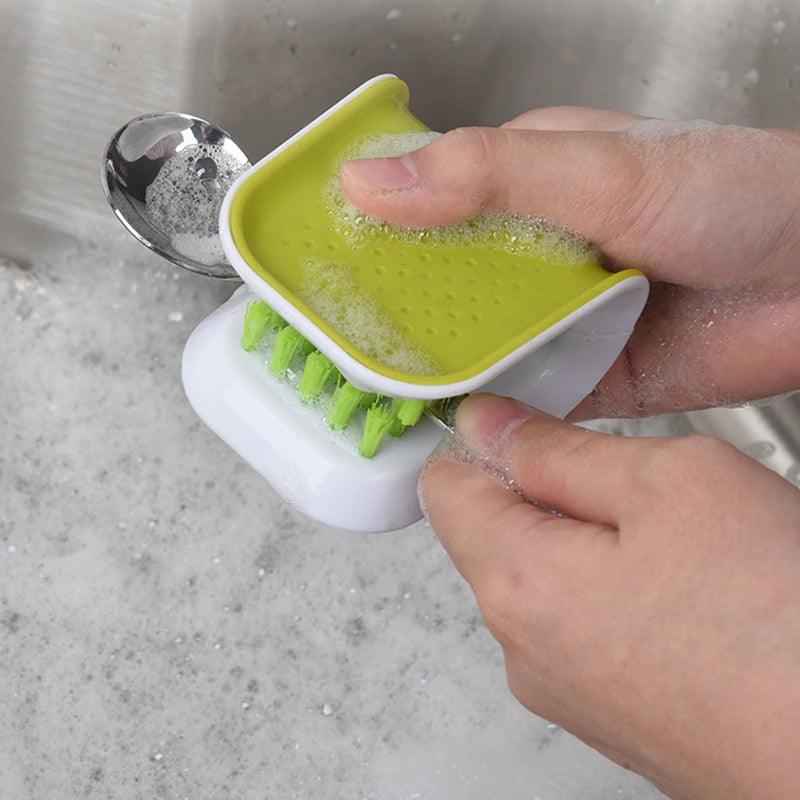 Sink Hero Utensil Scrubber - Demonstration of scrubbing utensils in the sink.