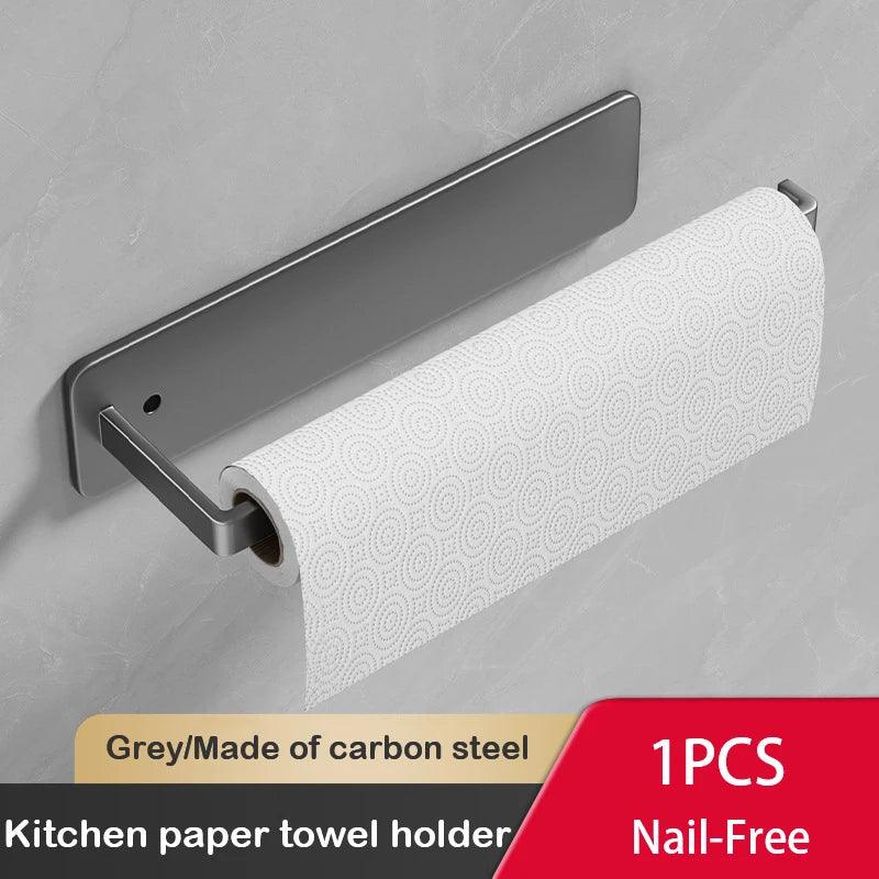 Wall-mounted silver space-saving kitchen rack holding a paper towel roll.