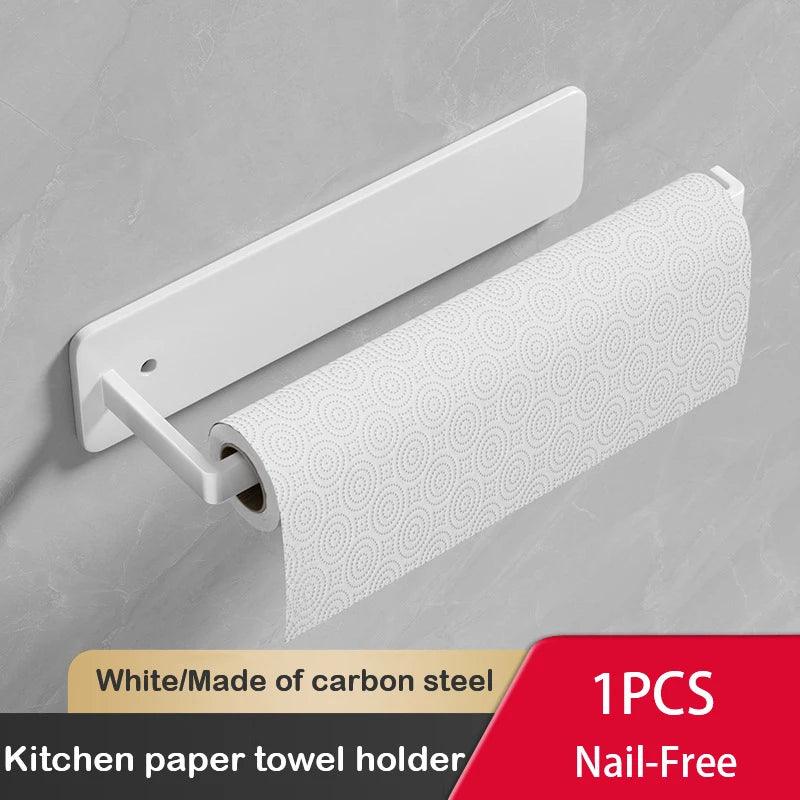 Wall-mounted white space-saving kitchen rack holding a paper towel roll.