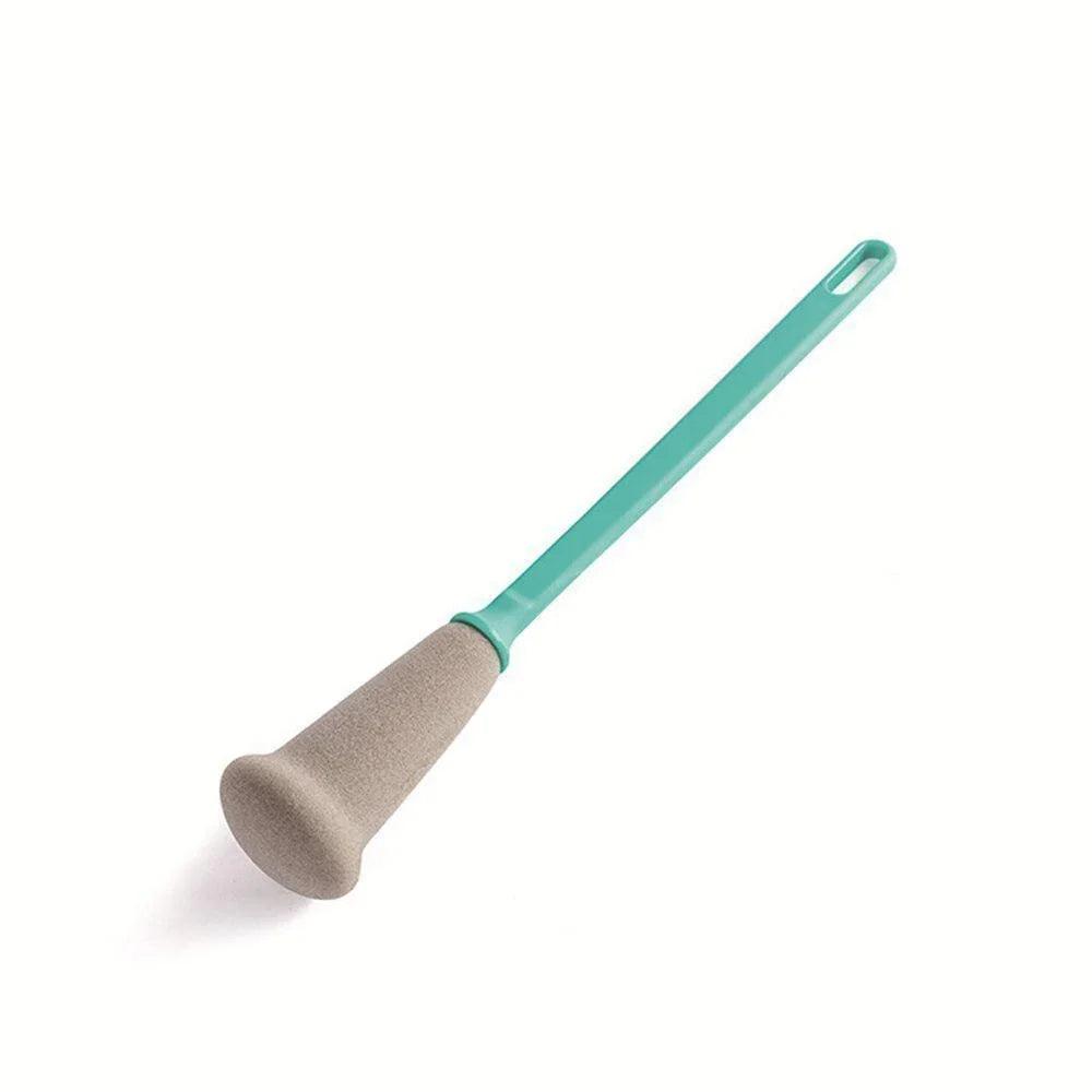 Green Versatile bottle cleaning brush with long handle for effective cleaning.