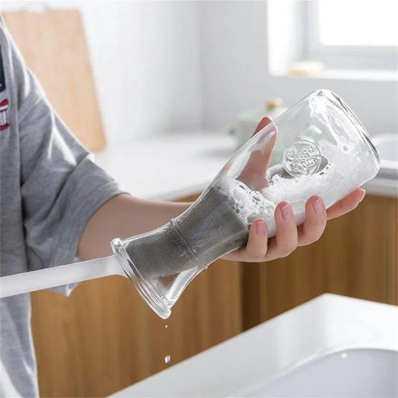 Demonstration of the versatile cleaning brush being used to clean a bottle.